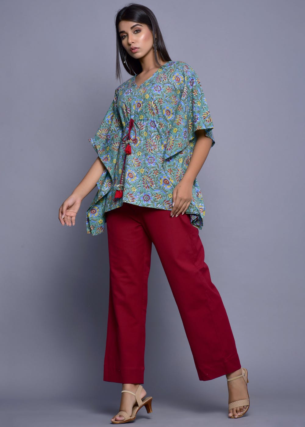 Get Floral Printed Green Kaftan Tunic With Red Pants Co Ords At