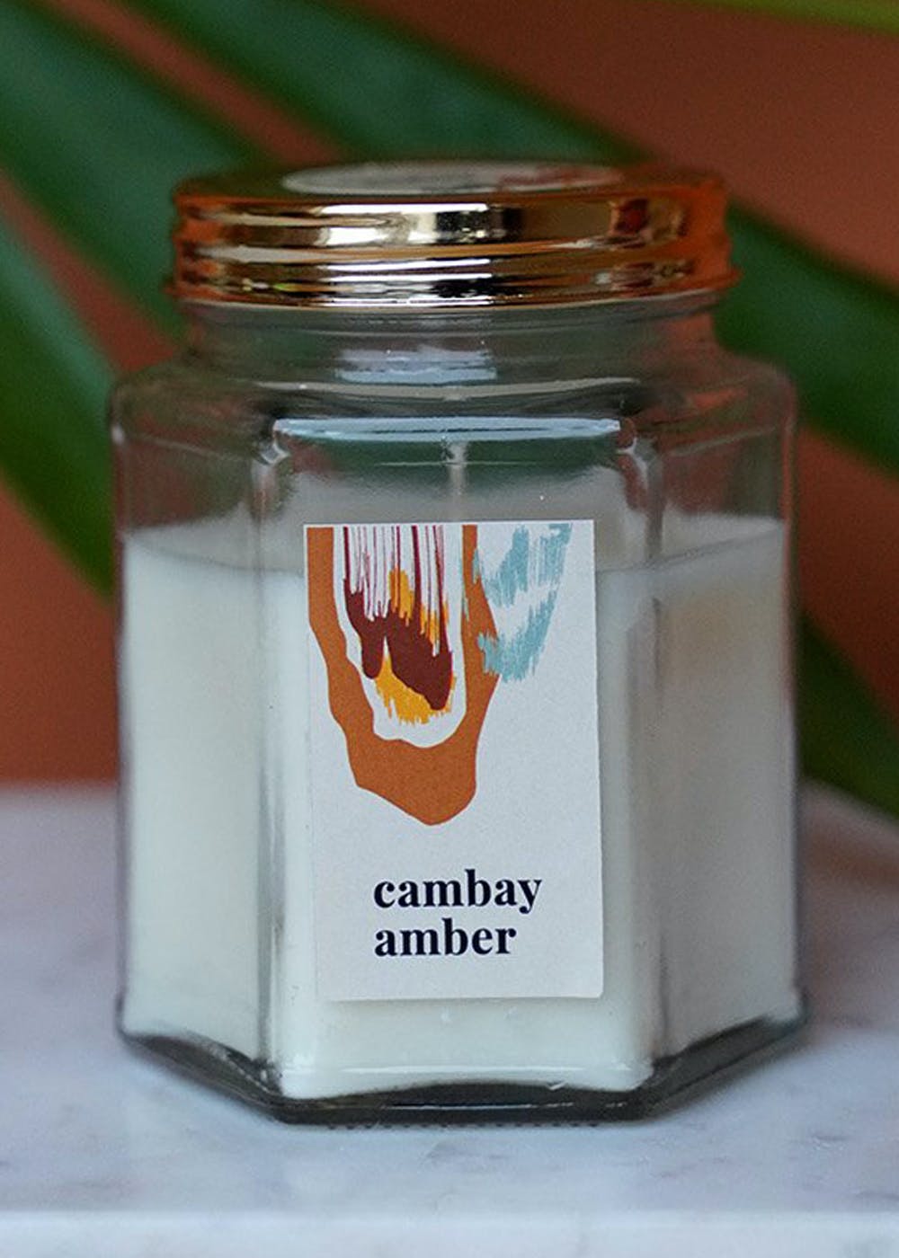 Get Dark Amber & Ginger Lily Scented Candle Glass Jar at ₹ 1380 LBB