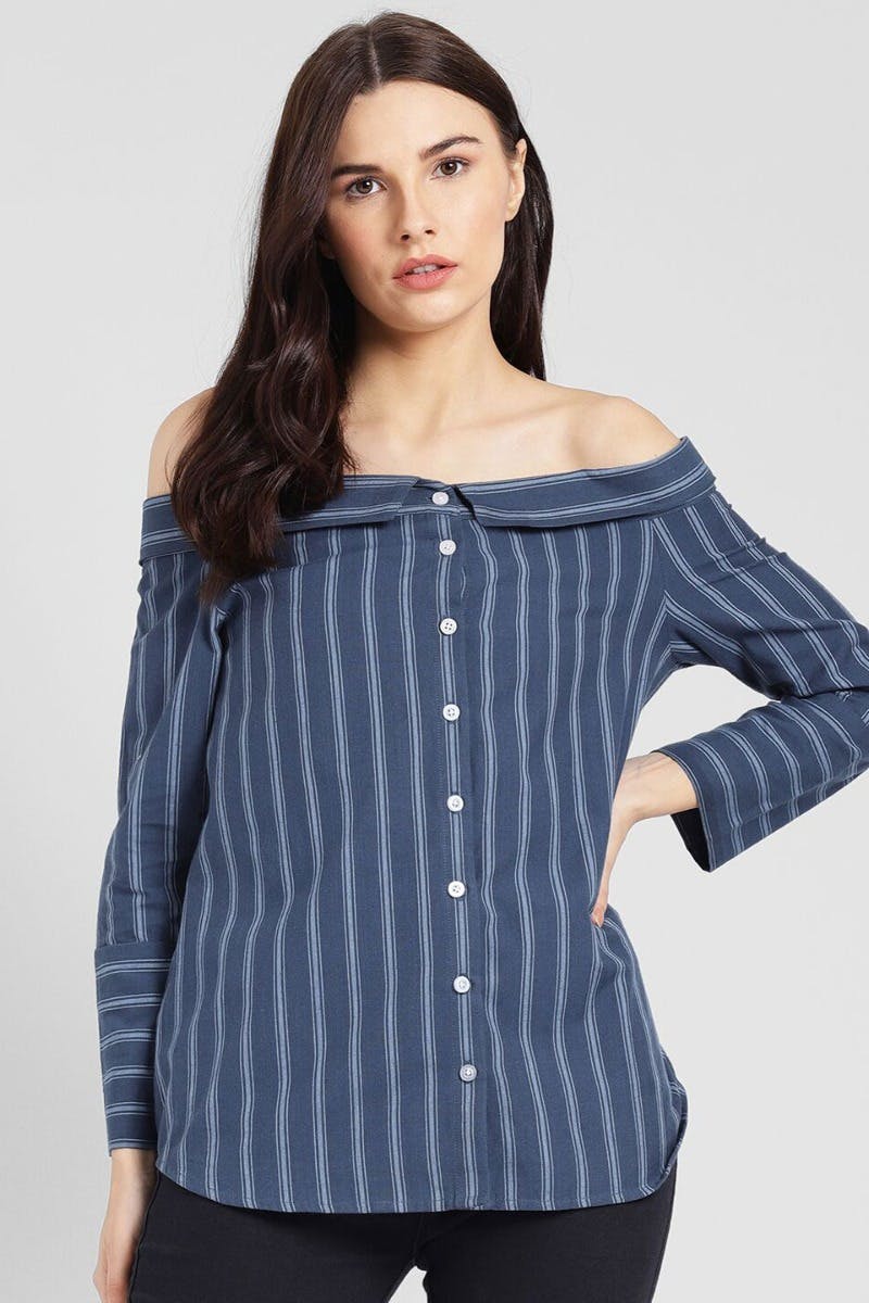 Clothing,Blue,Shoulder,White,Sleeve,Photo shoot,Waist,Blouse,Neck,Joint