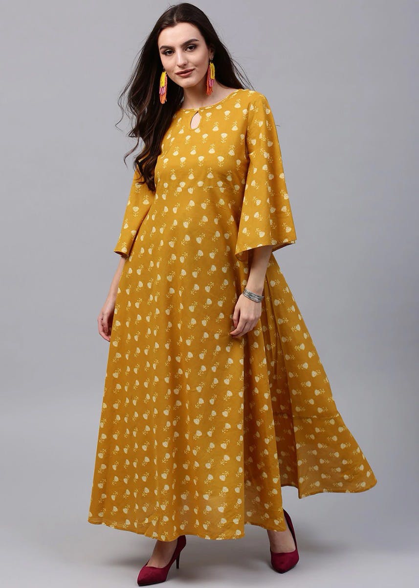 Get Floral Printed Keyhole Neck Mustard Flared Maxi Dress at ₹ 1189 ...