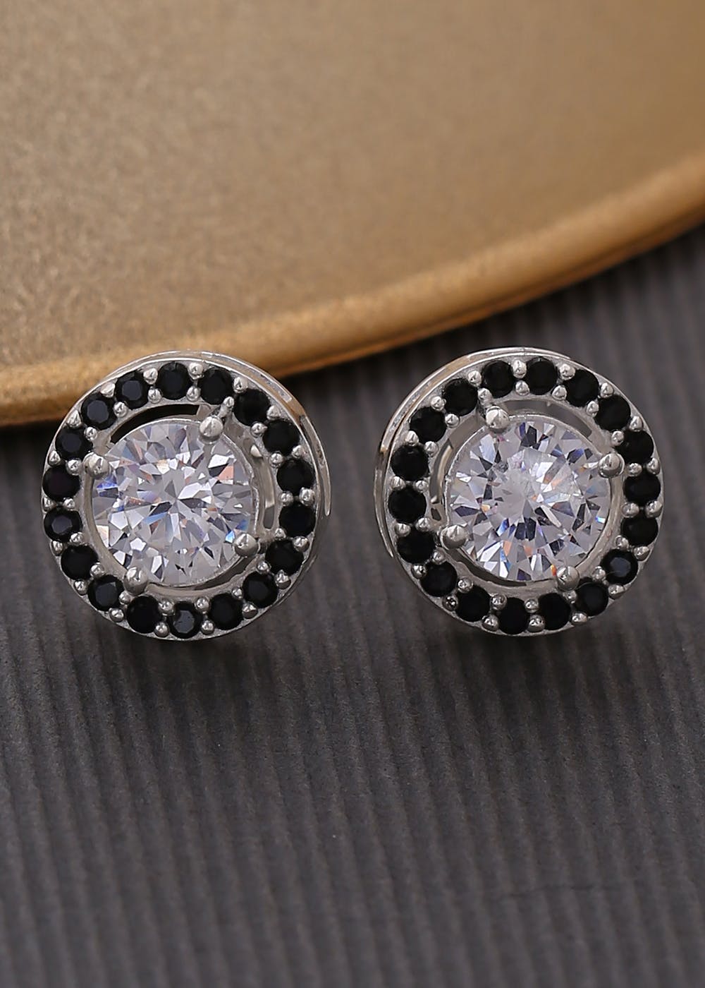 Earrings,Fashion accessory,Jewellery,Body jewelry,Gemstone,Ear,Silver,Circle,Button
