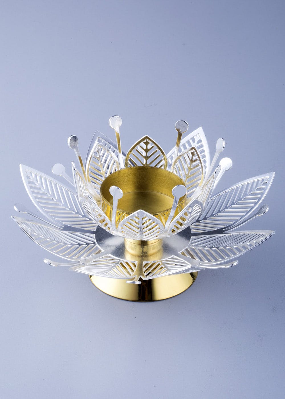 Get Gold & Silver Plated Flower Tealight Holder at ₹ 2650 LBB Shop