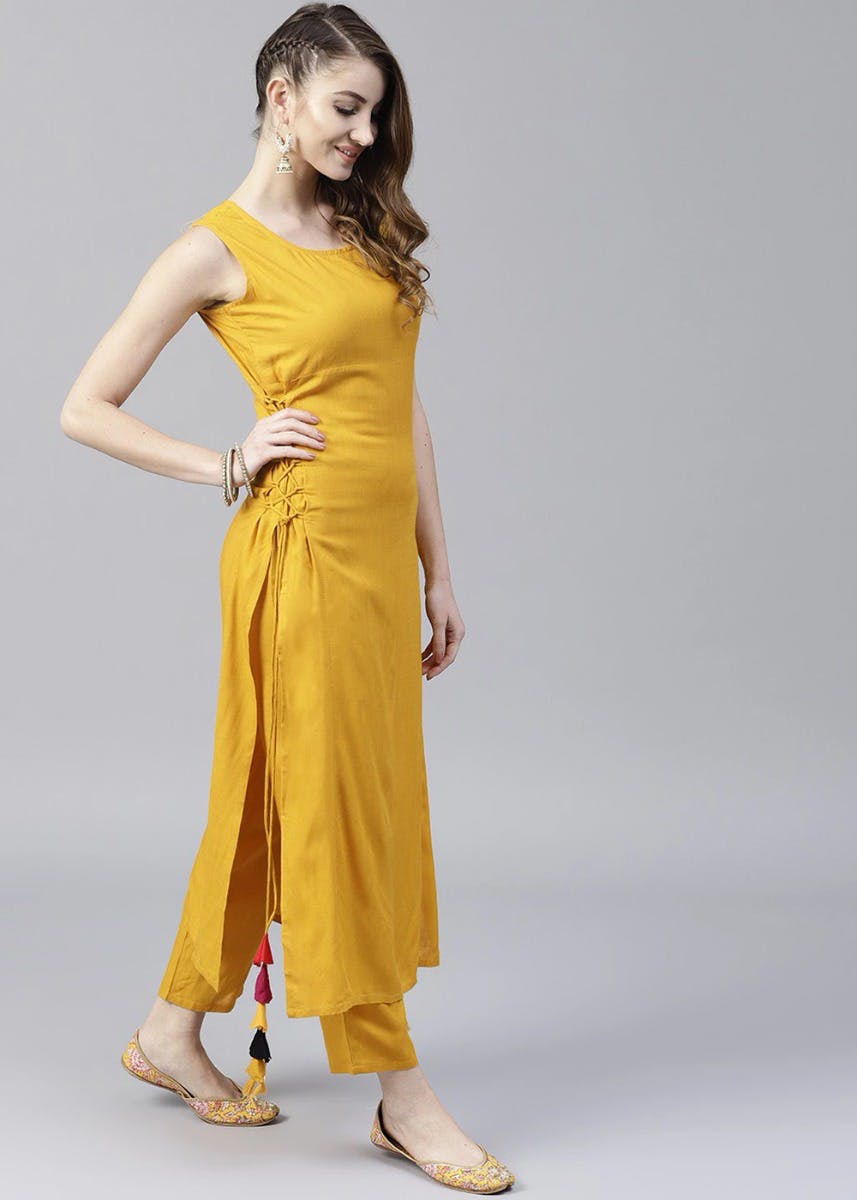 Offwhite side tieup kurta with palazzos by Aaryaa by Kashveen Kohli  The  Secret Label