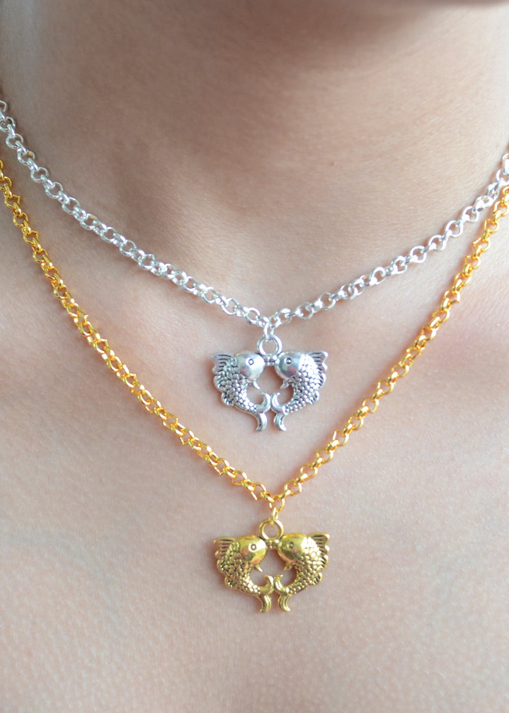 Get Twin Fish Love Heart Pendant with Double Chain Necklace at ₹ 519