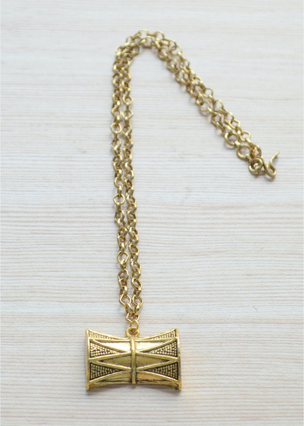 Gold damru pendant deals