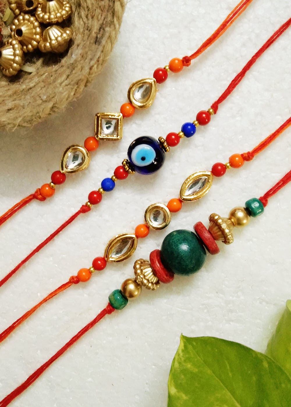 Get Kundan And Beads Multicolor Rakhis - Set of 4 at ₹ 500 | LBB Shop