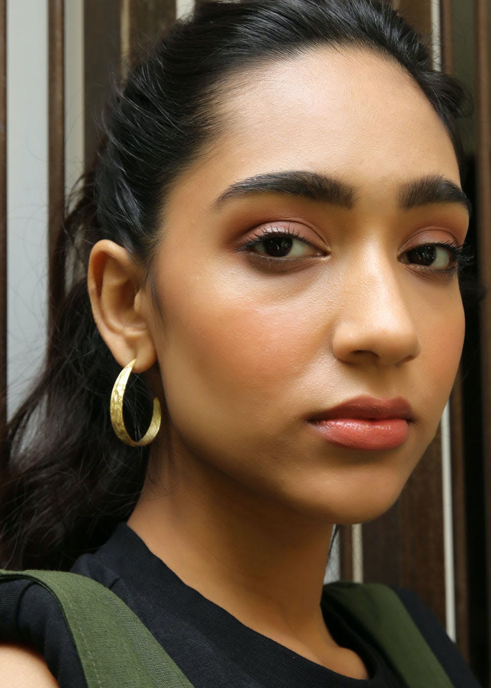 Get Ridged Oval Golden Hoops at ₹ 899 LBB Shop