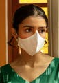 Chin,Eye,Eyebrow,White,Eyelash,Vision care,Neck,Eyewear,Sleeve,Headgear