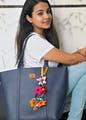Shoulder,Clothing,Hairstyle,Long hair,Joint,Fashion accessory,Photo shoot,Black hair,Photography,Bag