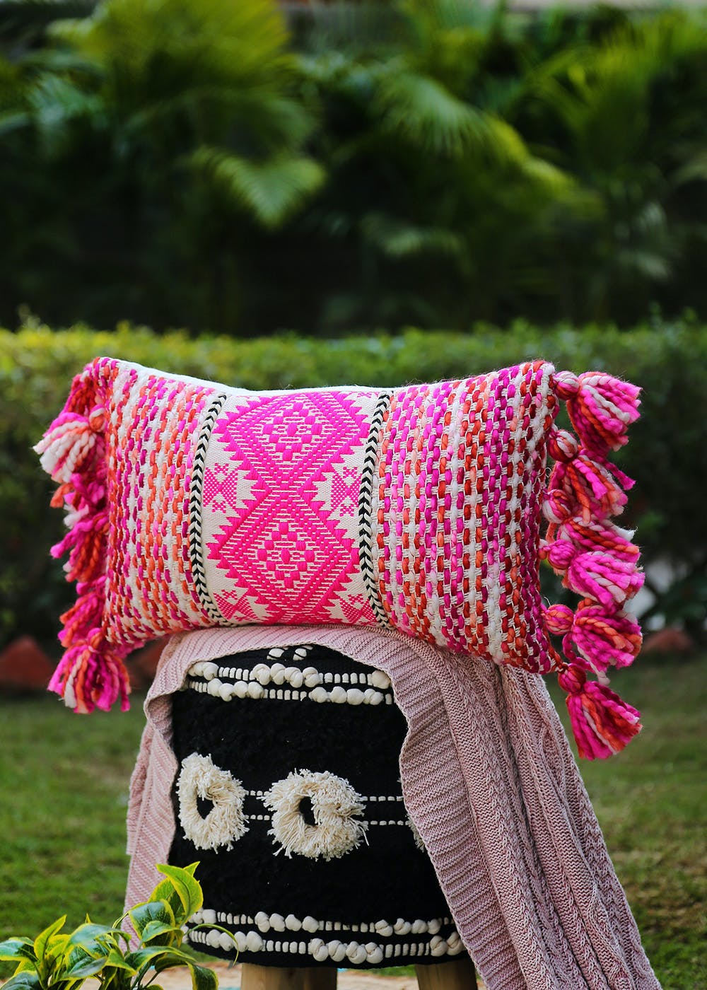 Get Hand Woven Cushion Cover With Acrylic Tassels at ₹ 1200 LBB Shop