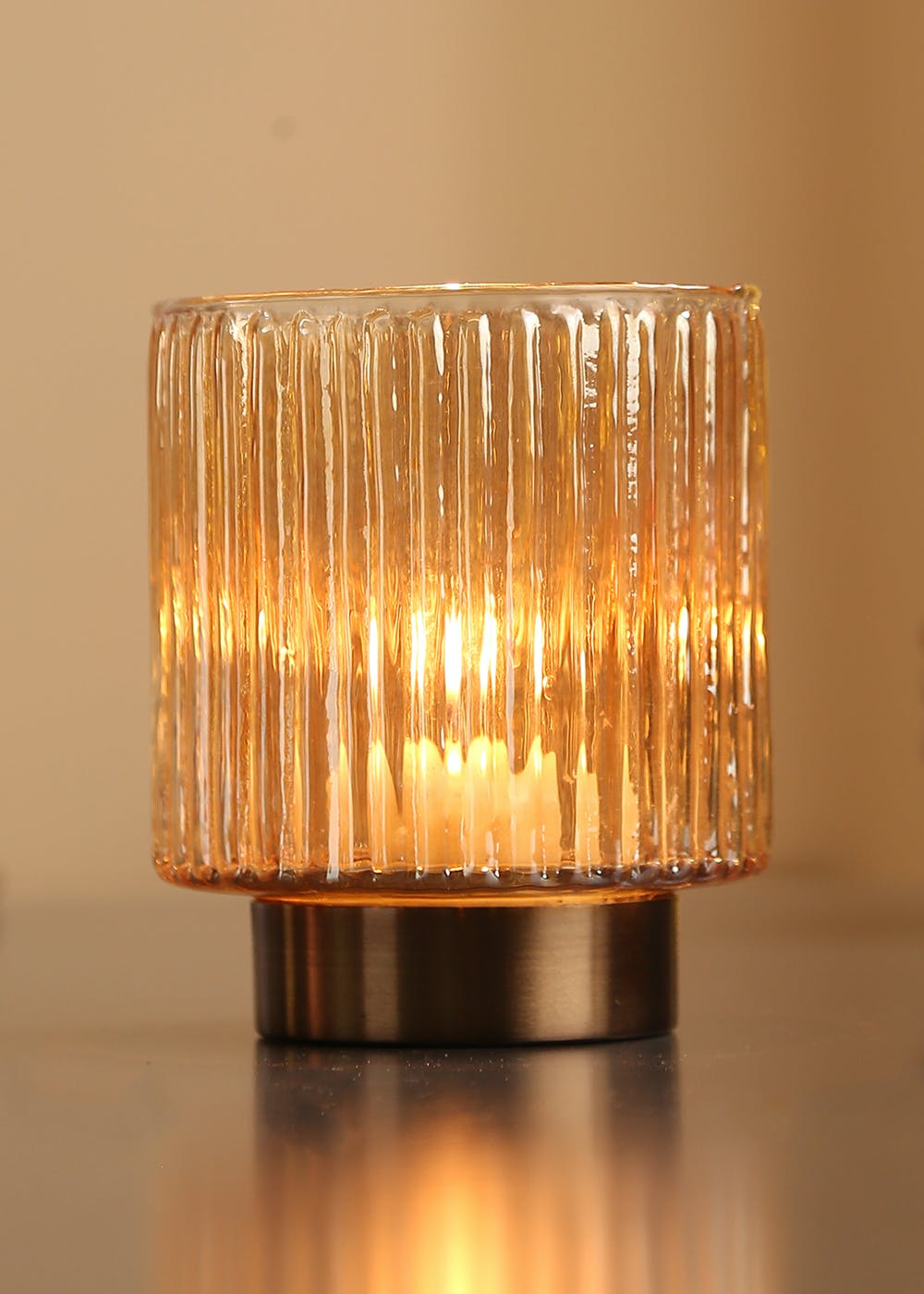 Get Fluted Glass Tea Light Holder With Metal Base at ₹ 638 LBB Shop