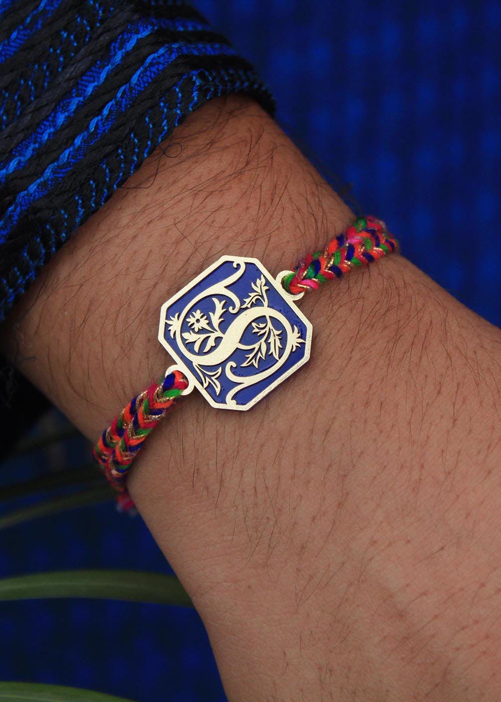 Get Royal Blue Floral Initial Acrylic Rakhi at ₹ 400 | LBB Shop