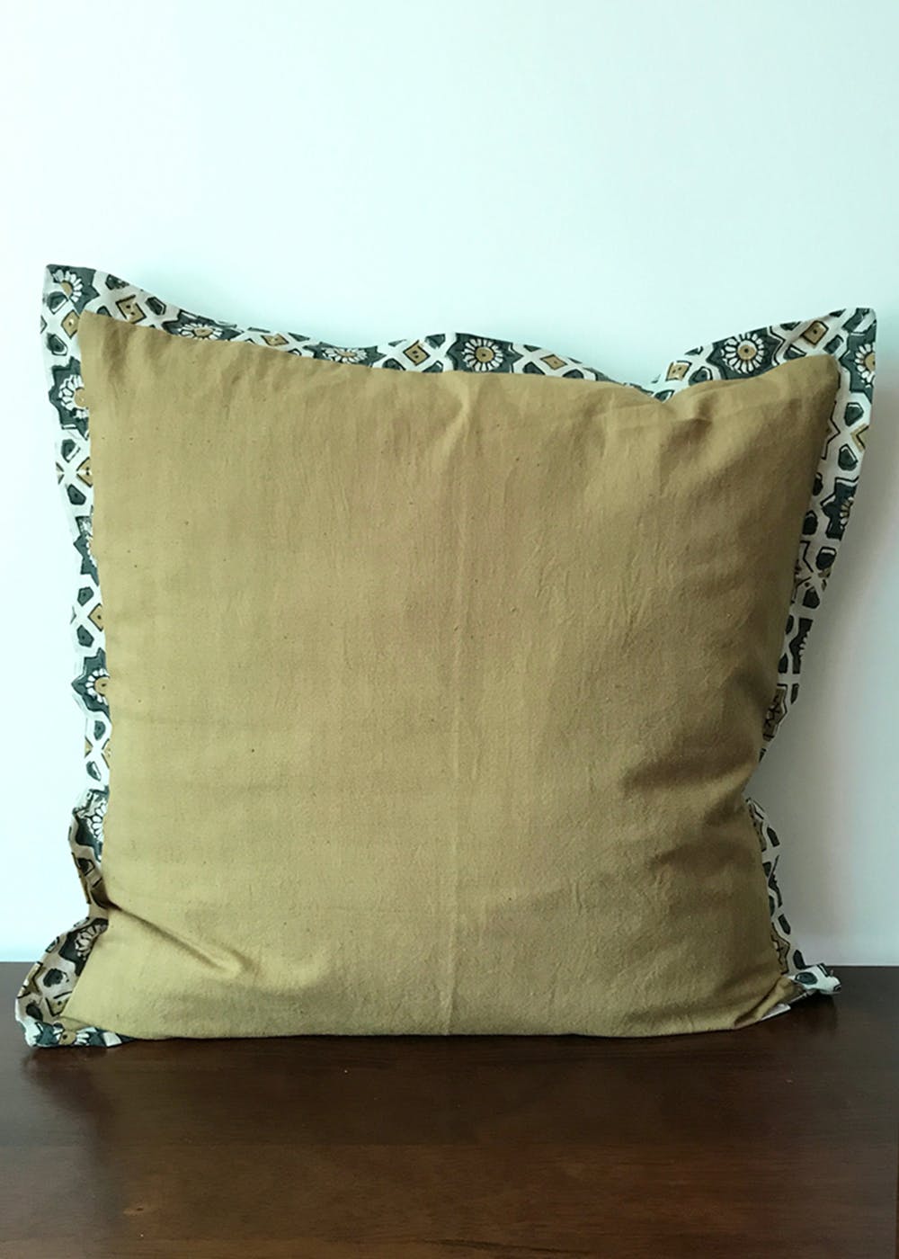 Get Mustard Green Ajrakh Cushion Cover at ₹ 999 LBB Shop