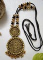 White,Body jewelry,Natural material,Necklace,Jewellery,Jewelry making,Creative arts,Metal,Chain,Fashion accessory