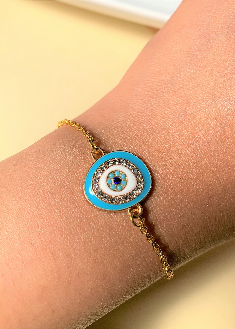 Get Turquoise Evil Eye Bracelet with Gold Plated Chain at ₹ 500 LBB Shop