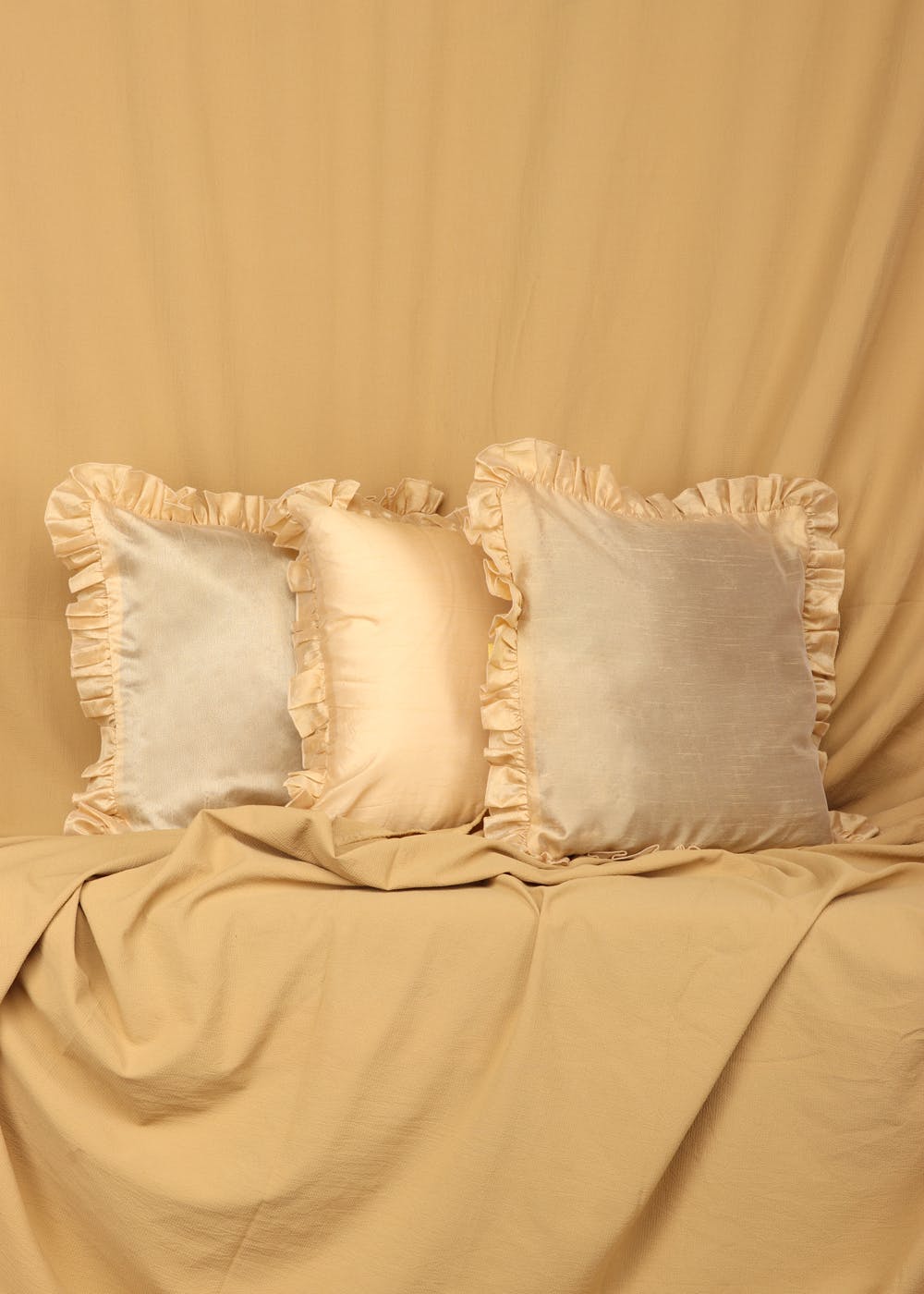Get Cream Silk Ruffled Cushion Covers, Pack Of 3 at ₹ 499 LBB Shop