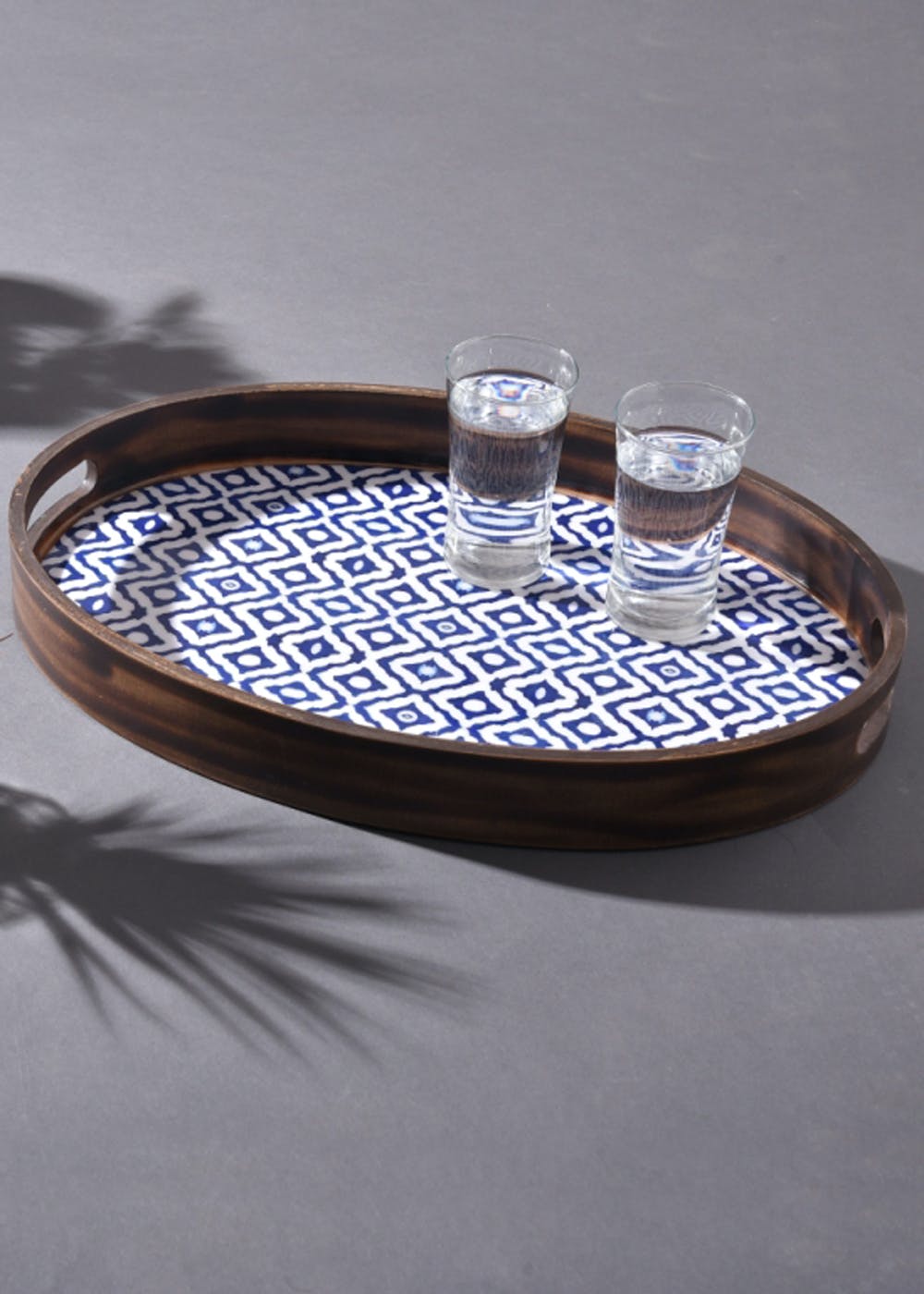 Get Abstract Indigo Oval Wooden Tray at ₹ 2398 | LBB Shop