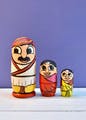 Cartoon,Animation,Toy,Animated cartoon,Action figure,Fictional character,Glasses,Smile,Illustration