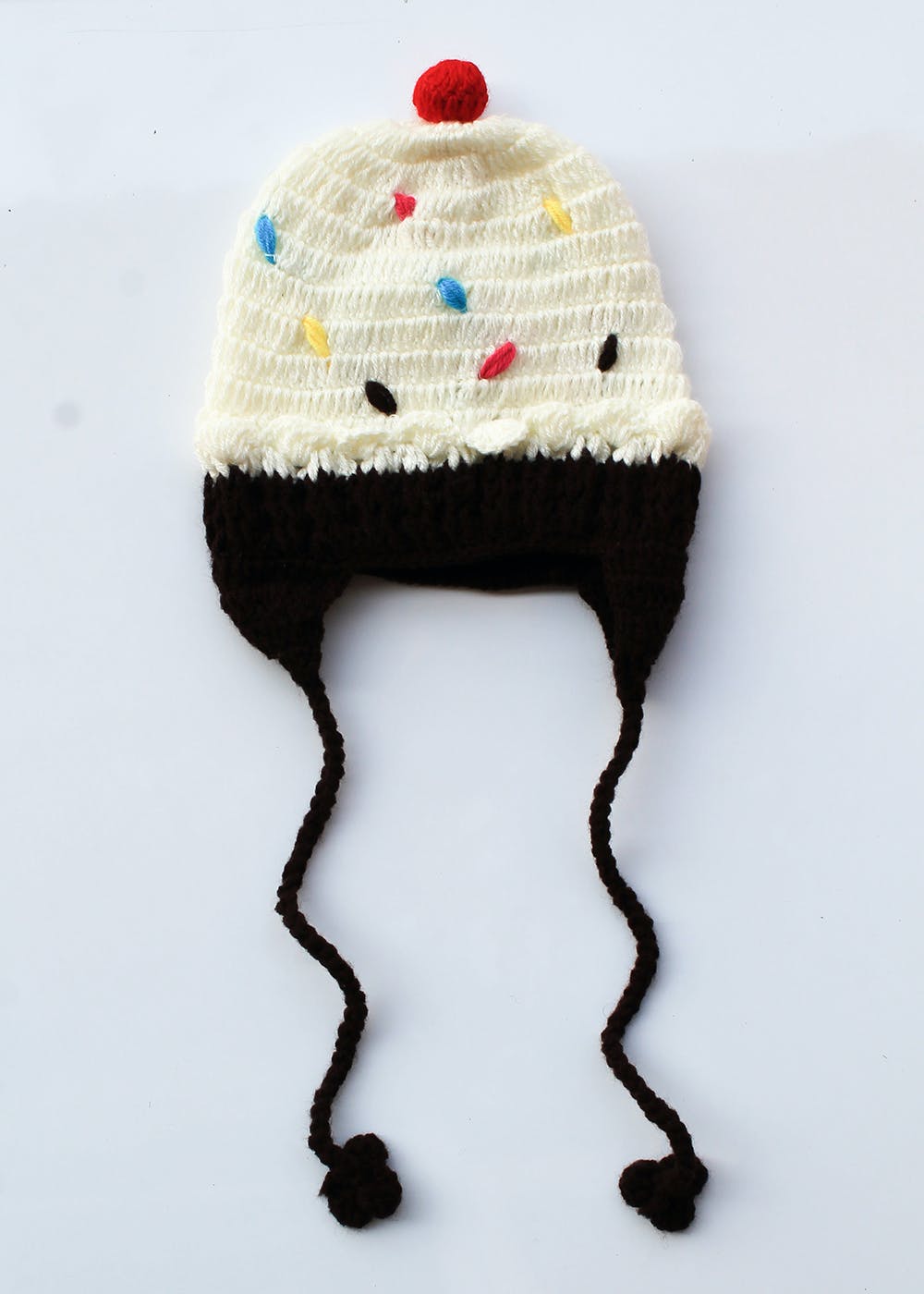 Cap,Costume hat,Hat,Creative arts,Pom-pom,Art,Woolen,Knit cap,Wool,Mushroom