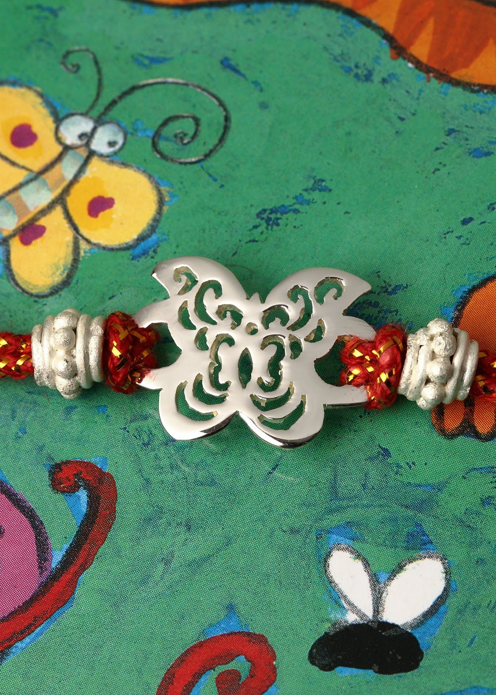 Get Silver Plated Cut Out Butterfly Rakhi at ₹ 360 | LBB Shop