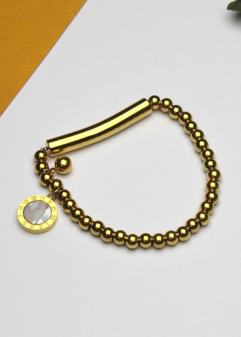 Golden Bracelet With Black And White Motif