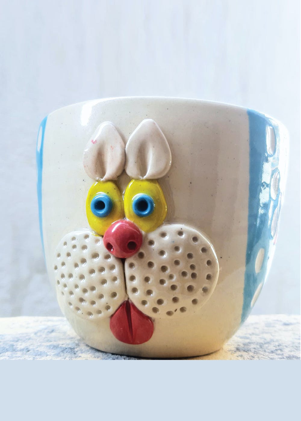 Tableware,Drinkware,Toy,Dishware,Cup,Font,Serveware,Bone,Stuffed toy,Button