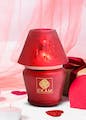 Drinkware,Cup,Serveware,Lamp,Red,Material property,Christmas decoration,Tints and shades,Costume hat,Magenta