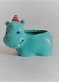 Toy,Aqua,Font,Snout,Electric blue,Plastic,Animal figure,Fashion accessory,Stuffed toy,Baby toys
