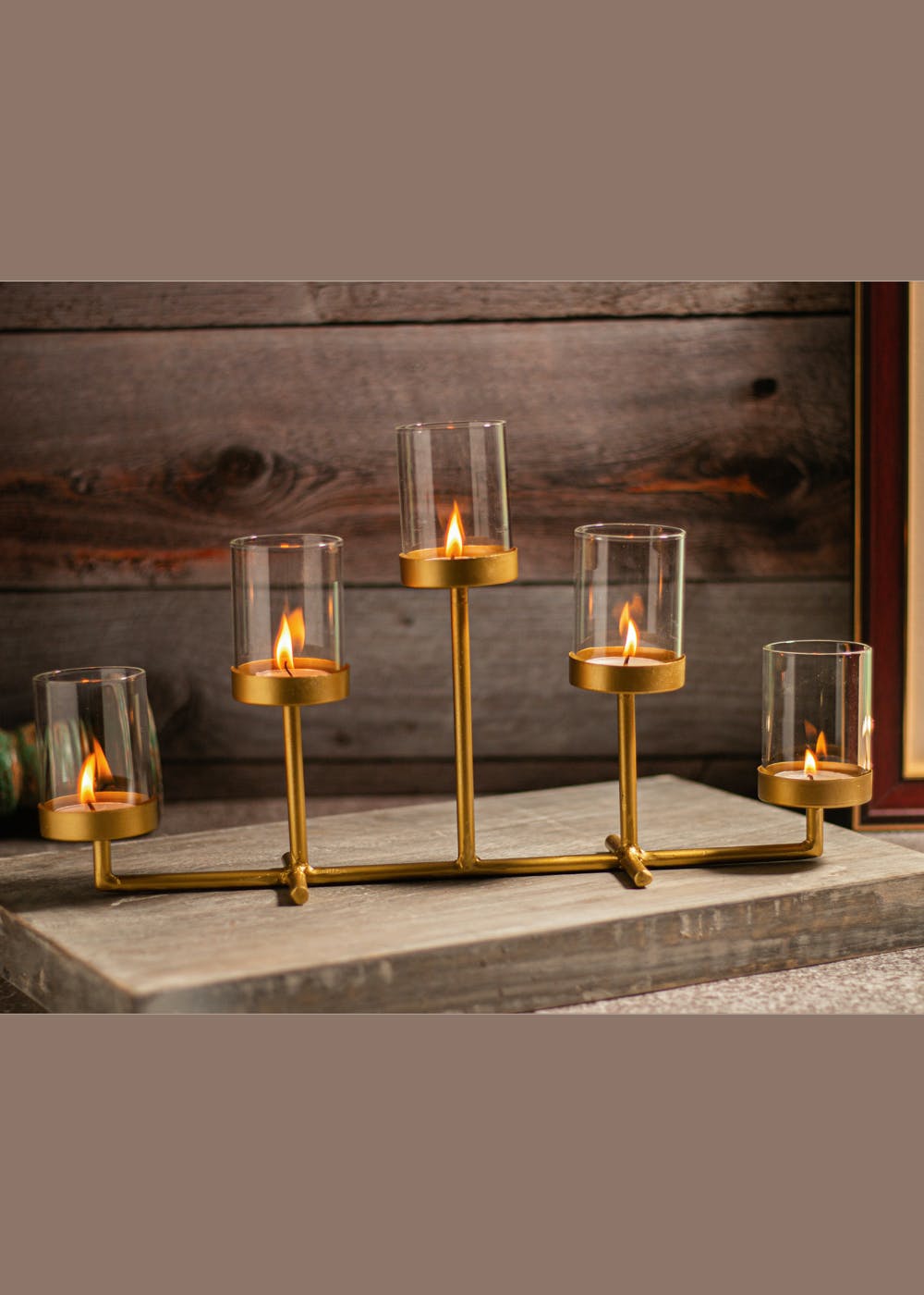 Get Golden Colored Tea Light Holder For 5 Tea Lights On Horizontal Bar