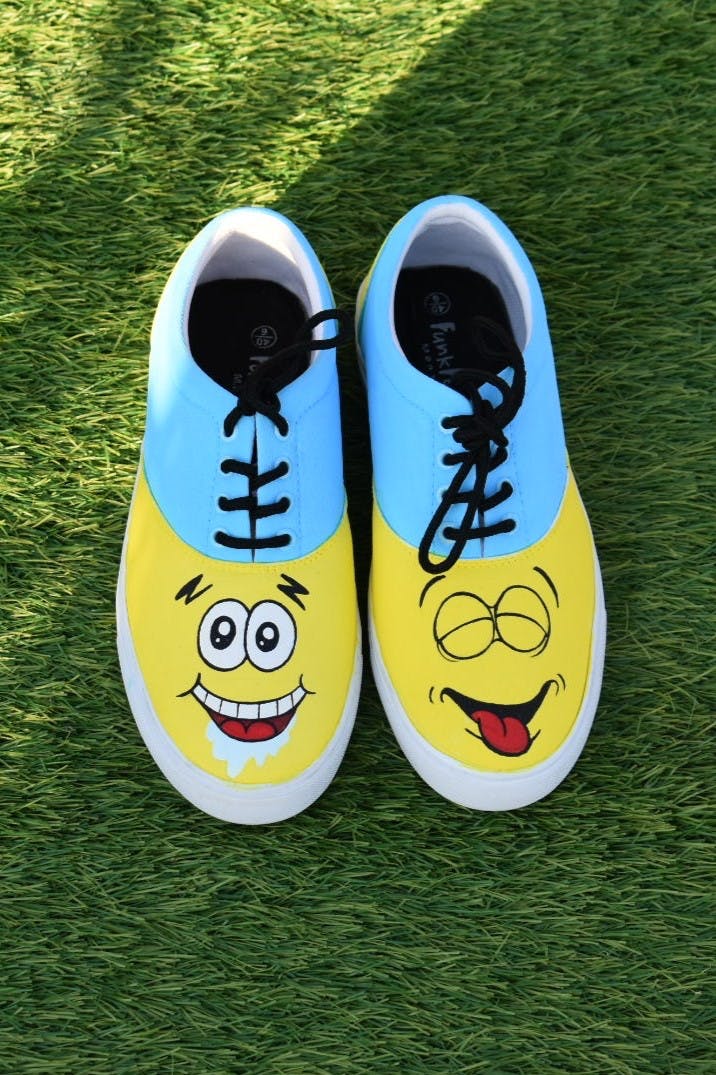 Get Handpainted Happy Face Sneakers at 