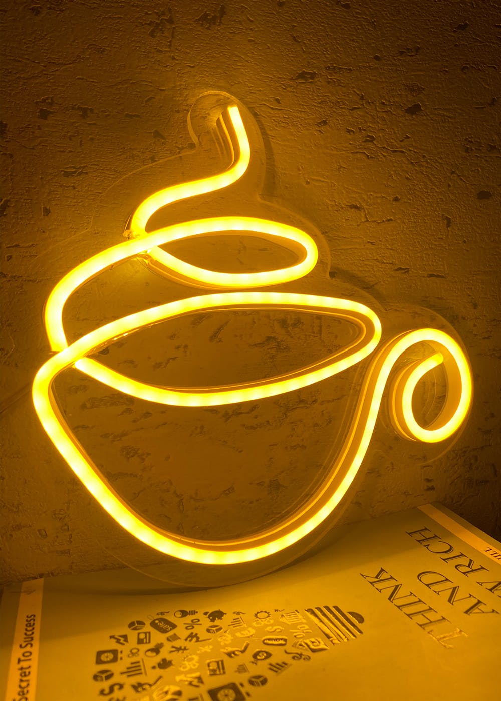 Light,Amber,Font,Art,Gas,Circle,Symbol,Signage,Graphics,Handwriting
