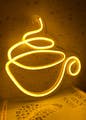 Light,Amber,Font,Art,Gas,Circle,Symbol,Signage,Graphics,Handwriting