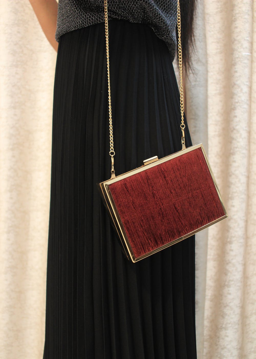 Dark red clutch on sale bag