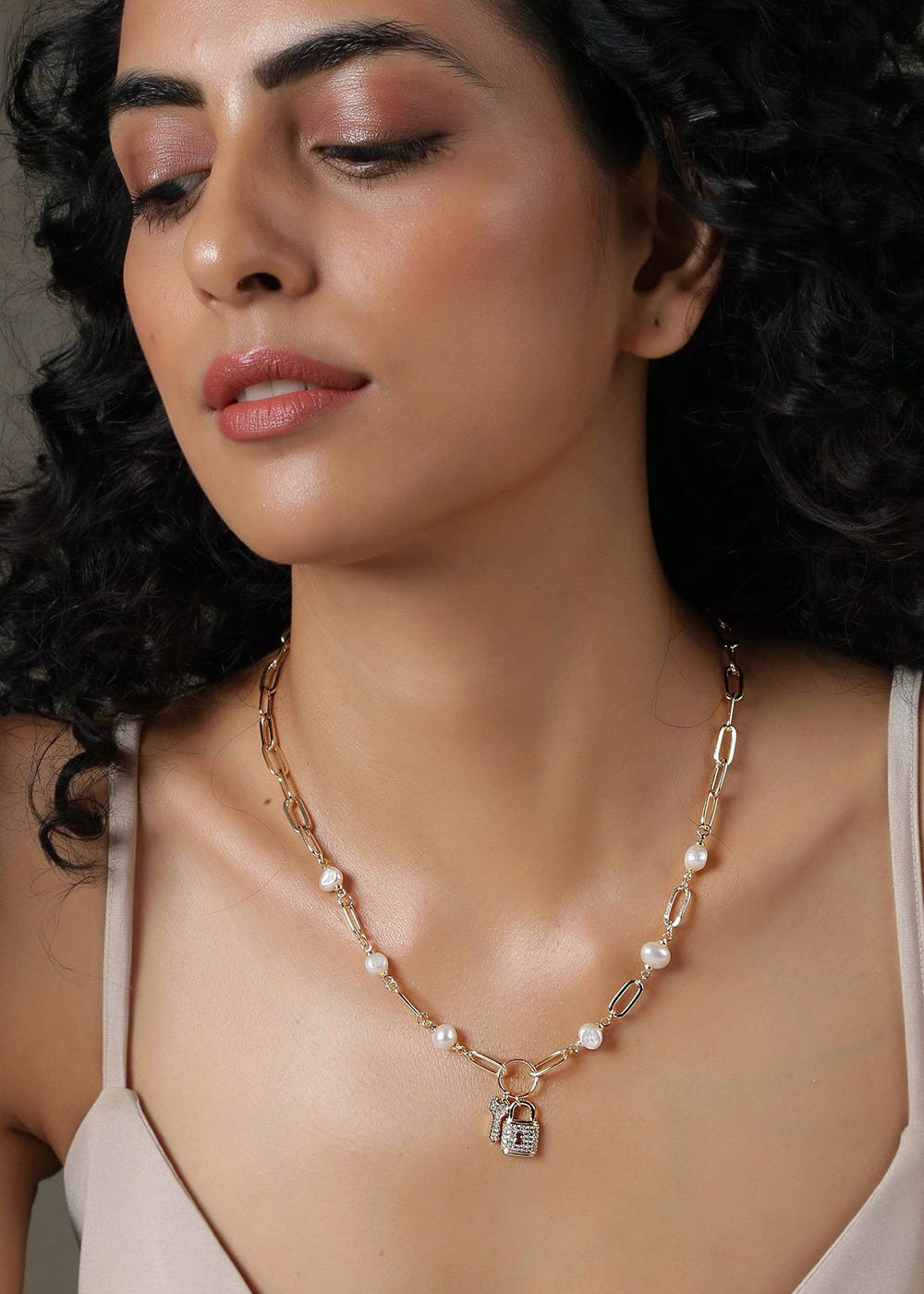 Get Lock & Key Pearl Necklace at ₹ 1150 LBB Shop