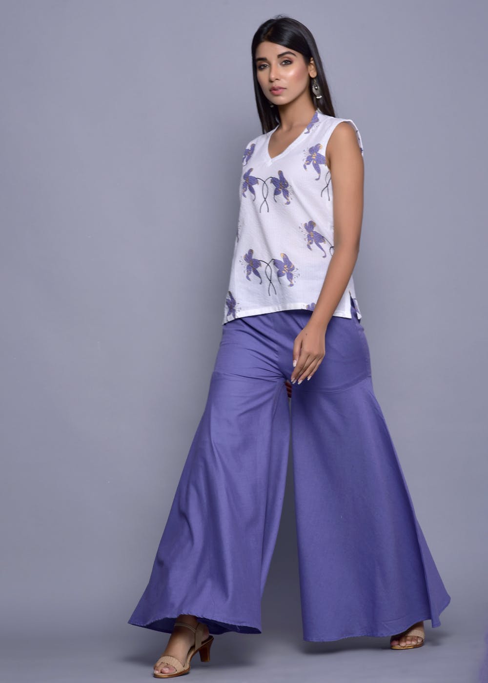 Get Floral Printed White Sleeveless Top 