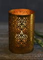 Orange,Amber,Cylinder,Still life photography,Lighting accessory,Peach,Natural material,Artifact