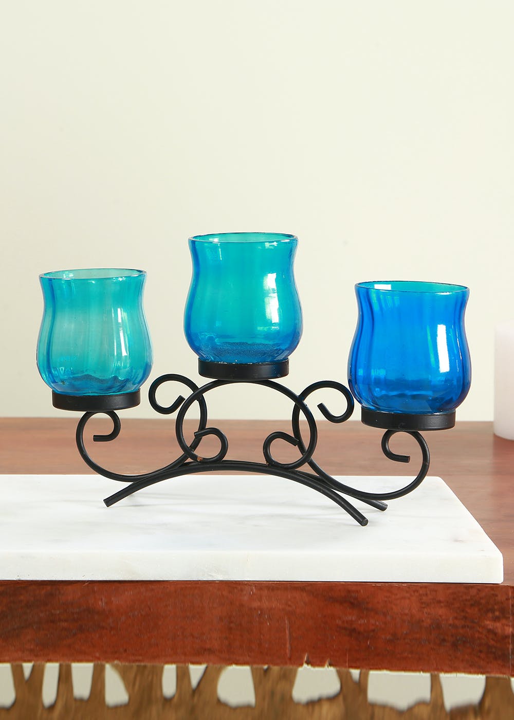 Get 3 Pot Glass and Metal Candle Holder Blue 10 inch long at ₹ 1344