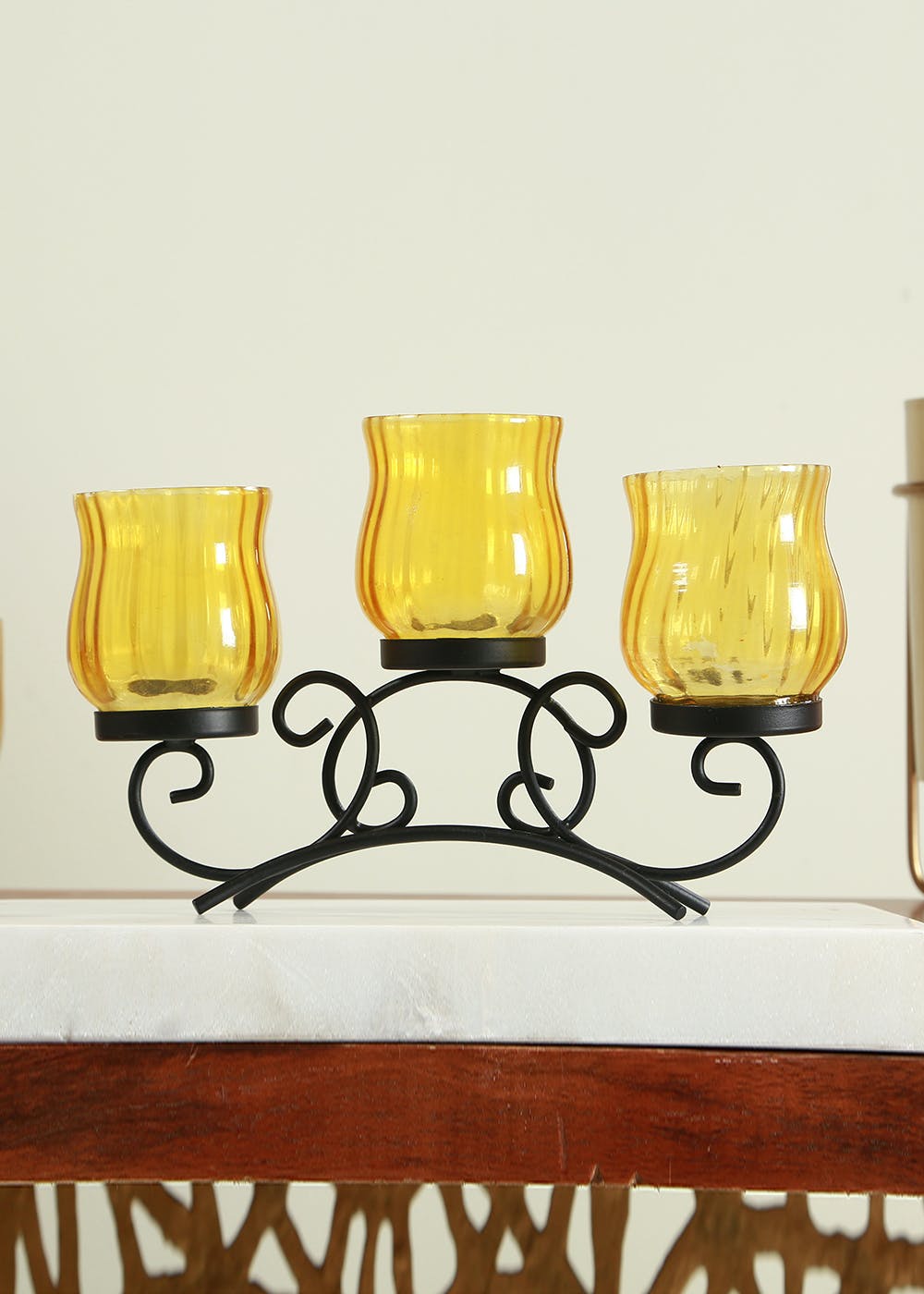 Get Handcrafted 3 Pot Glass and Metal Candle Holder Yellow 10 inch long at ₹ 1344 LBB Shop