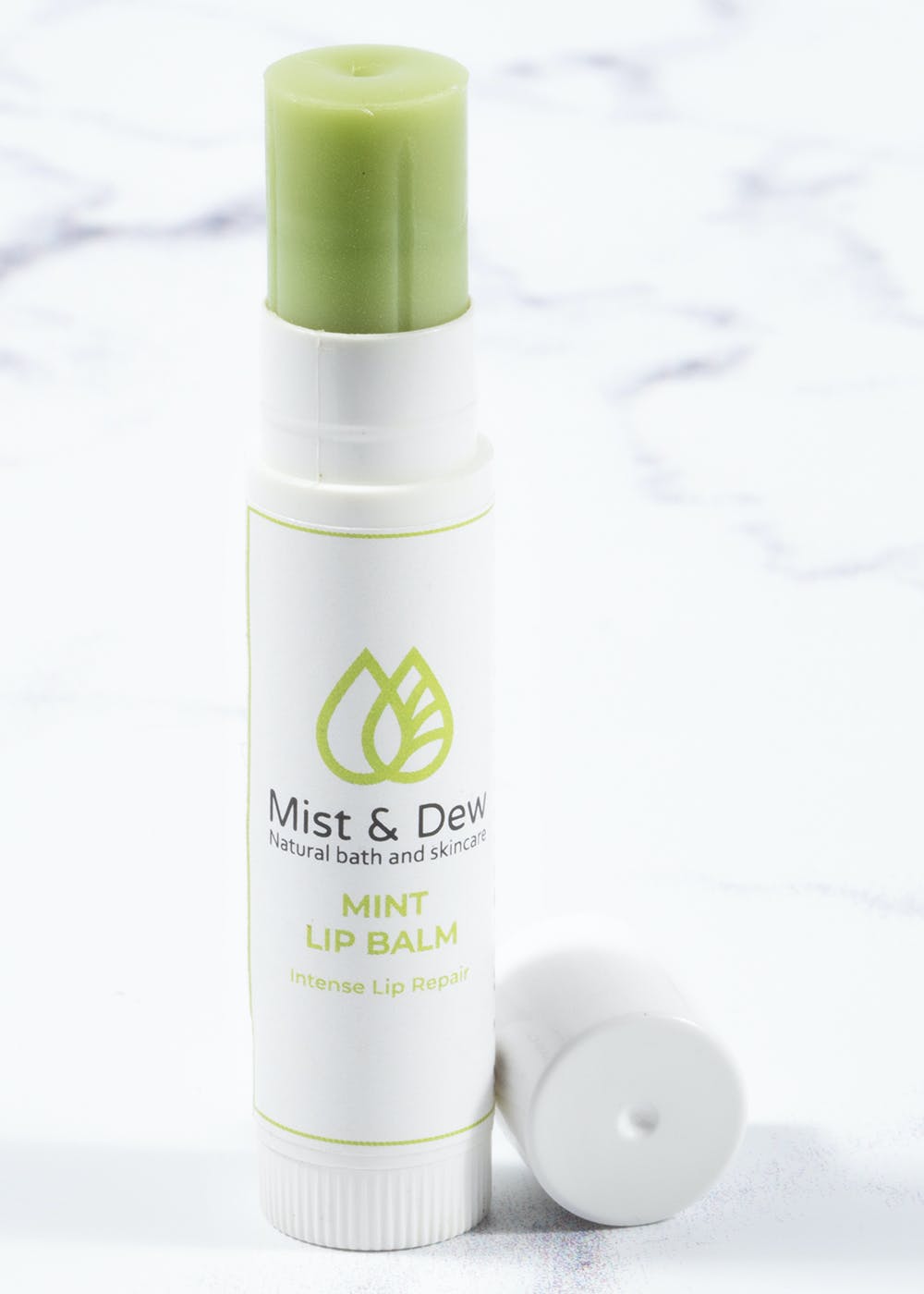 Product,Skin,Beauty,Skin care,Plastic bottle,Hand,camomile,Cream,Plant,Lotion