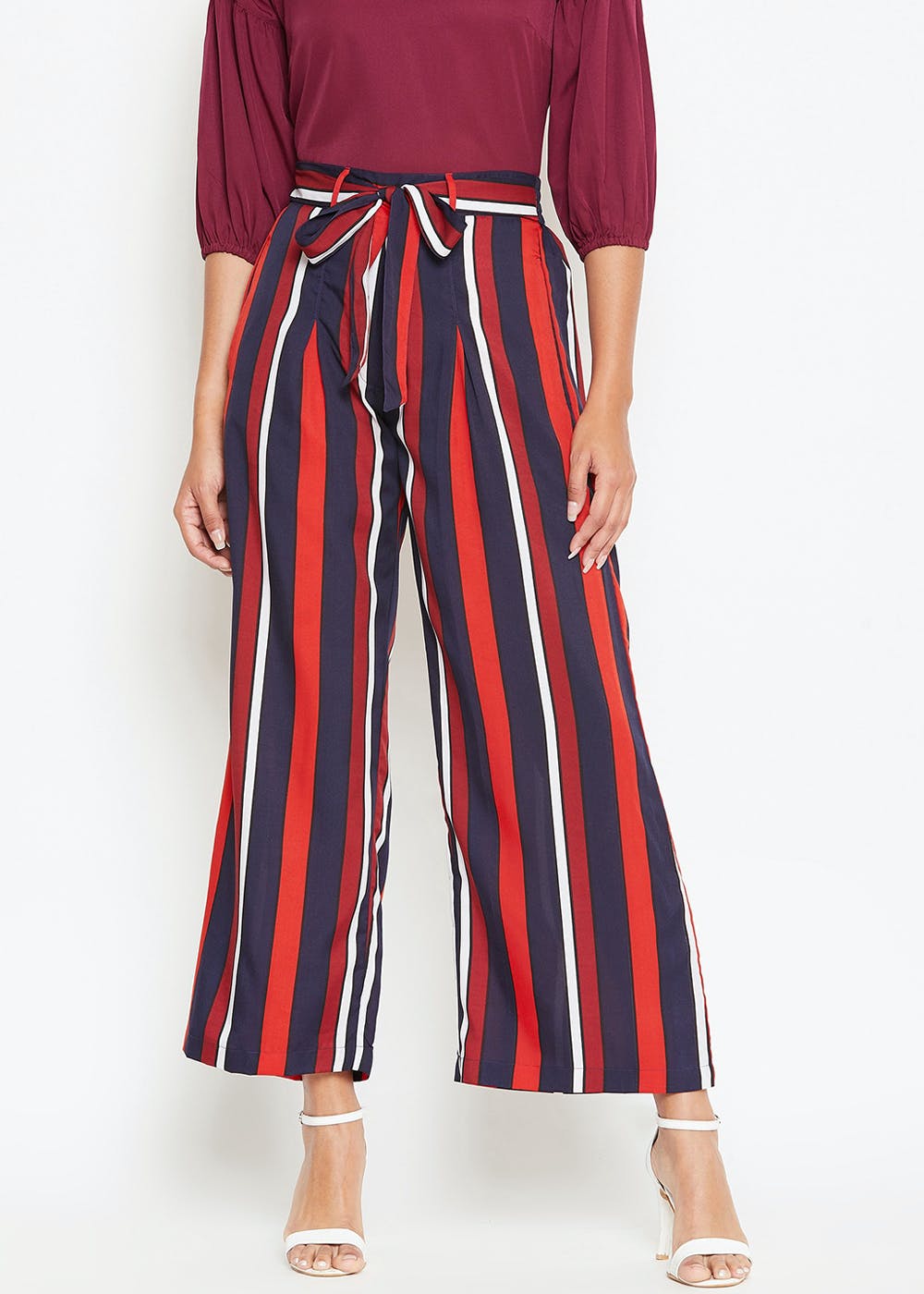 Get Waist Tie Detail Multicoloured Striped Flared Trousers at ₹ 499 ...