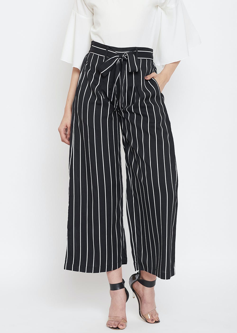 Get Waist Tie Monochrome Striped Poly Crepe Flared Trousers at ₹ 499