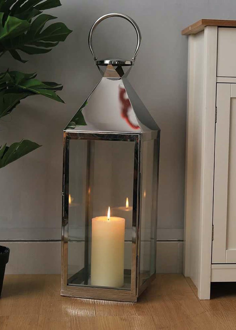 Get Decorous Stainless Steel Candle Lantern at ₹ 1499 LBB Shop