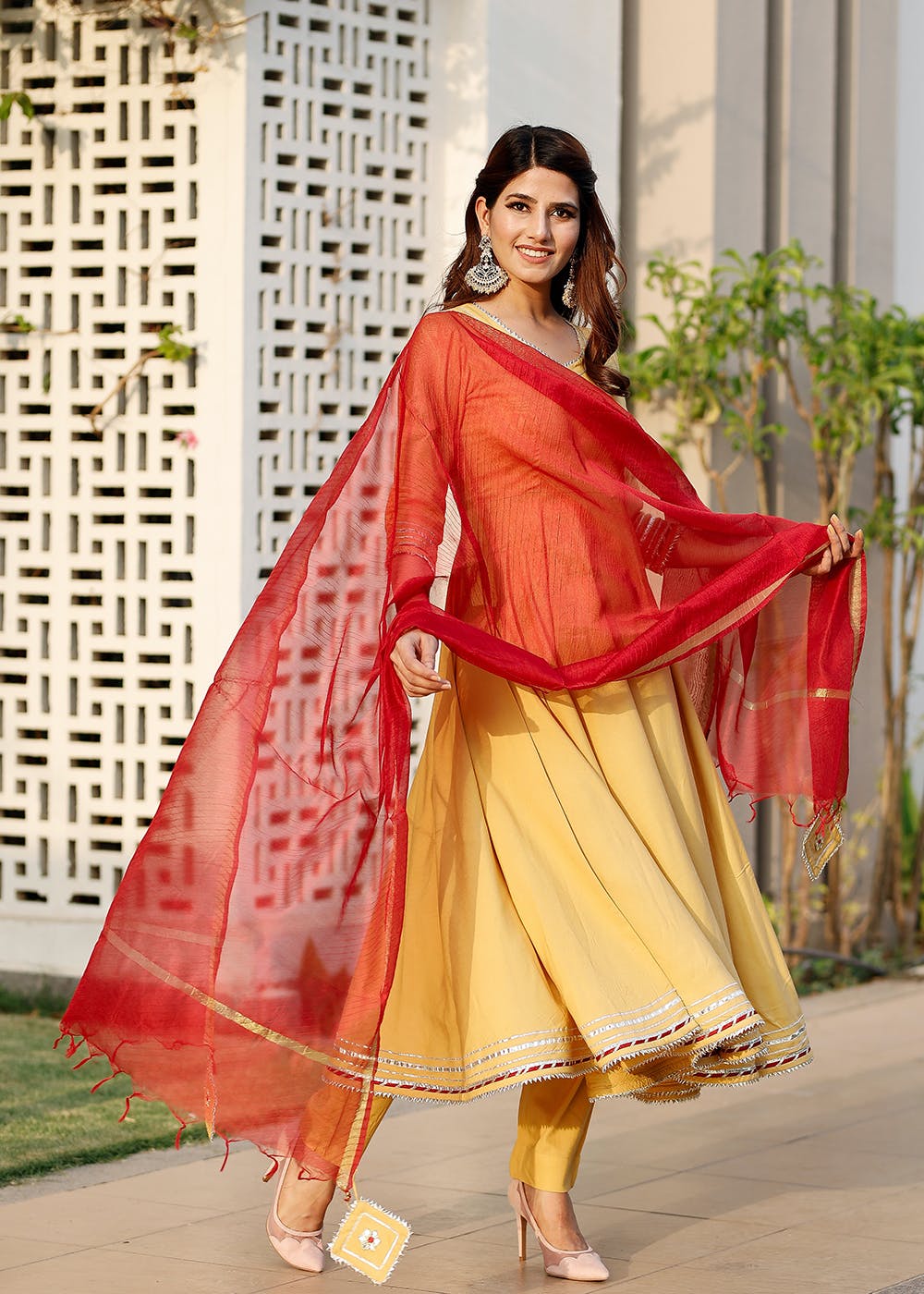 beige suit with red dupatta