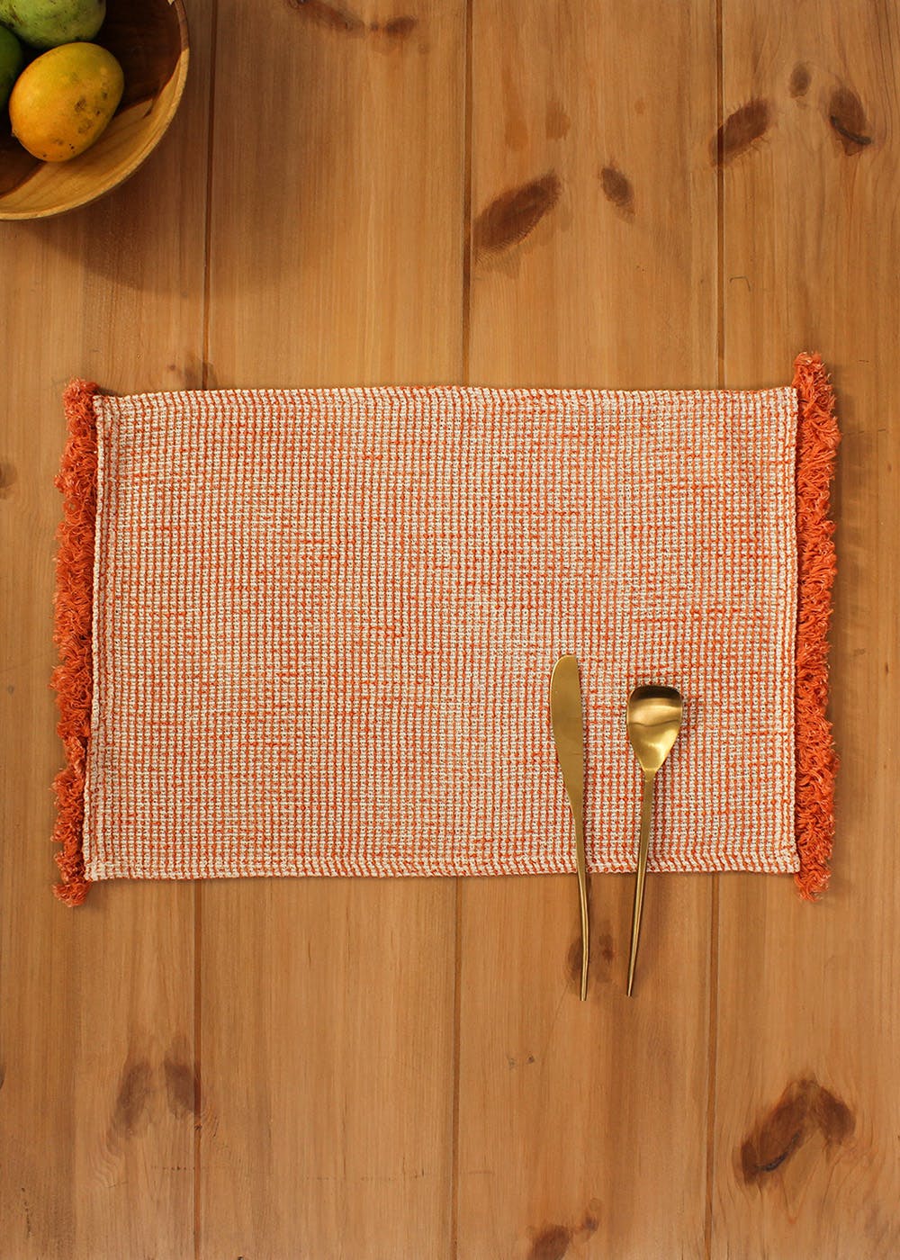 Get Woven Design Orange Placemat at ₹ 474 LBB Shop