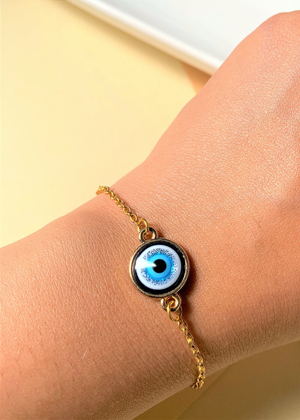 Get Black Evil Eye Bracelet with Gold Plated Chain at ₹ 500 LBB Shop