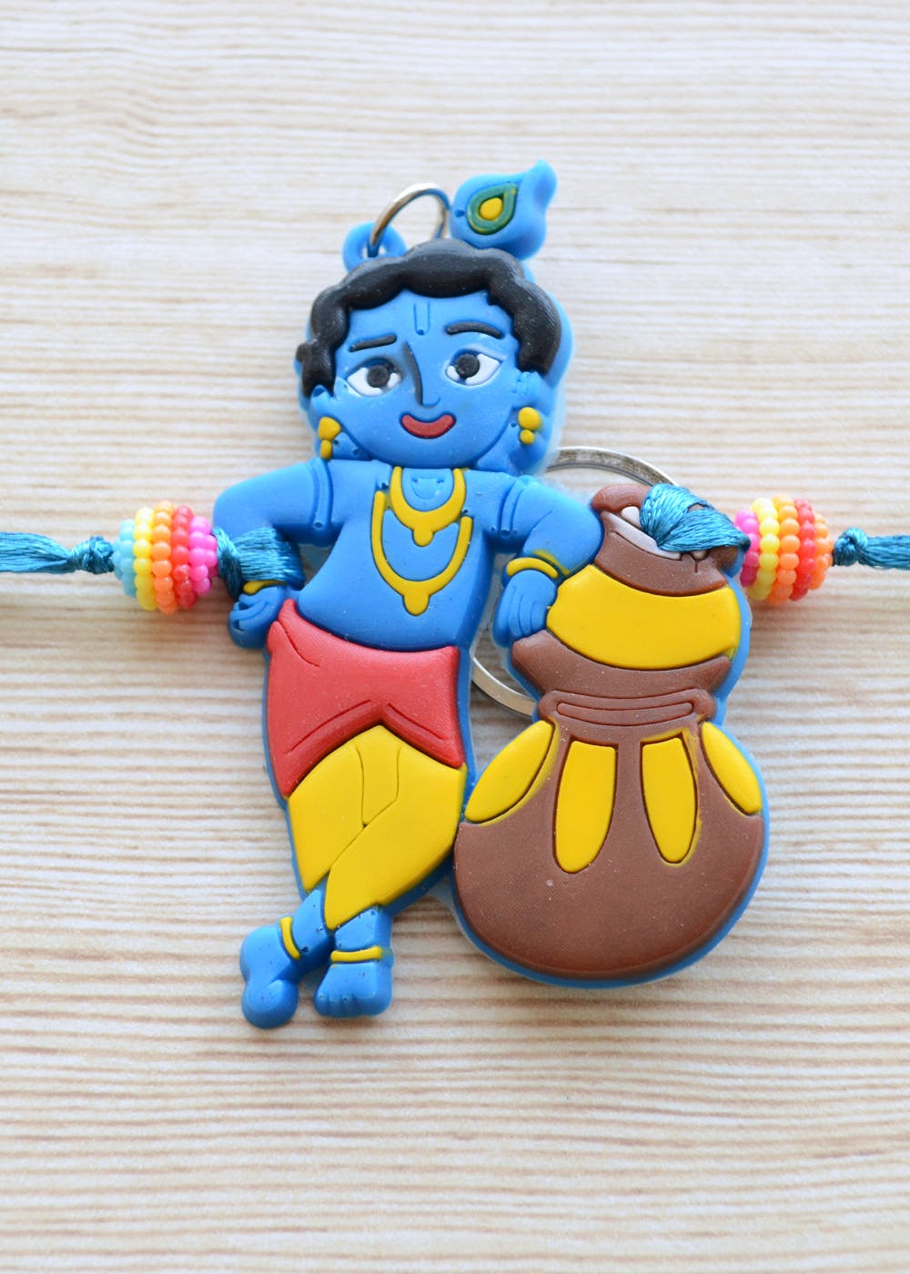 Get Cute Krishna Rakhi With Key Chain For Kids In Yellow Blue at ...