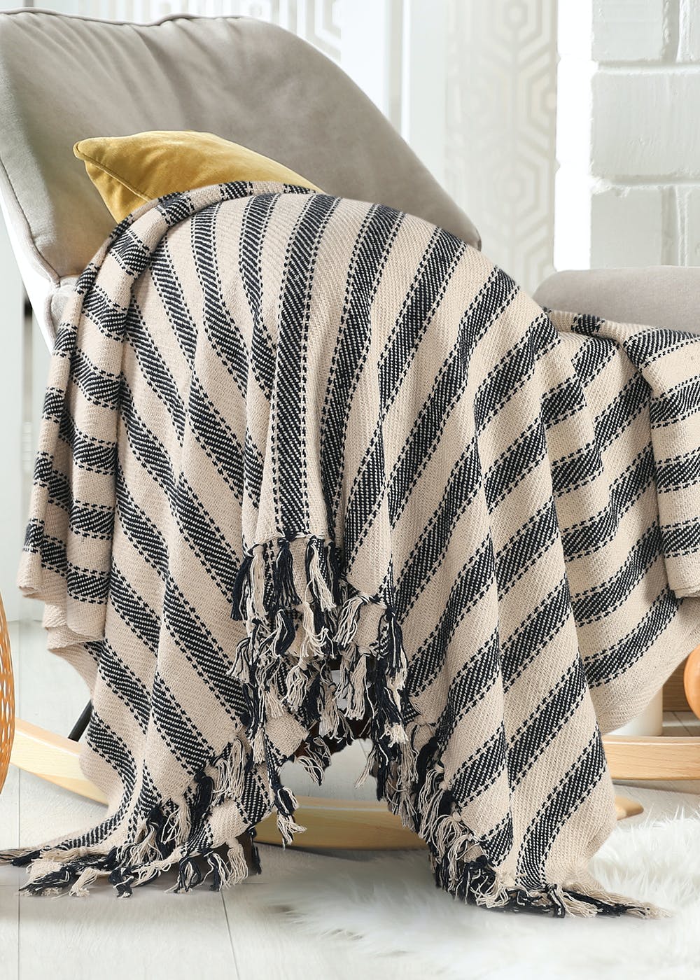 Get Navy Striped Sofa Throw With Tasseled Edges At ₹ 1199 