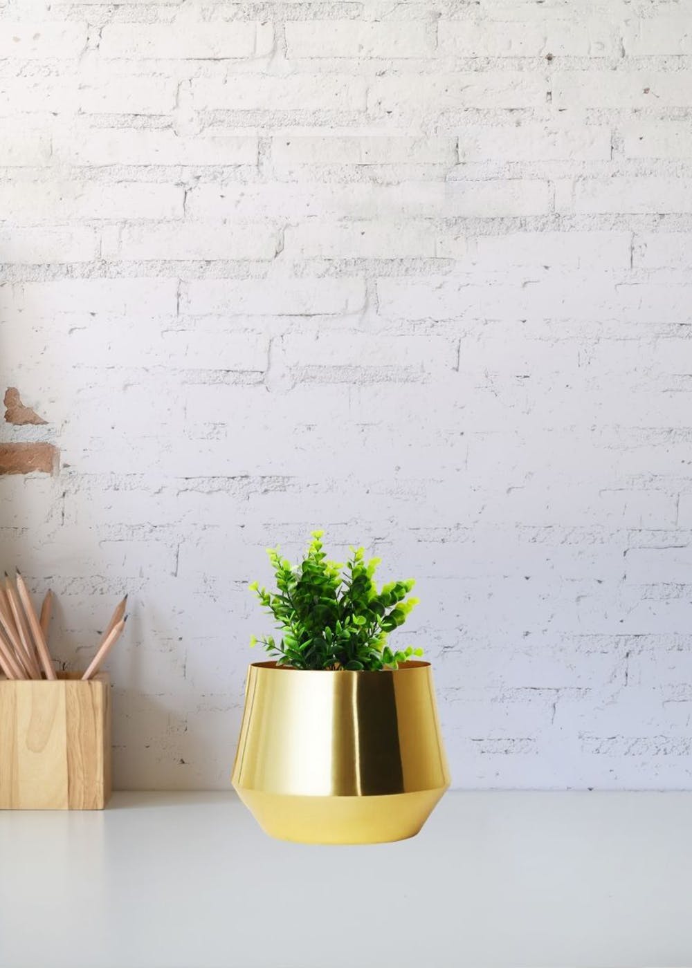Louis Vuitton unveils new gold-plated plant pot design