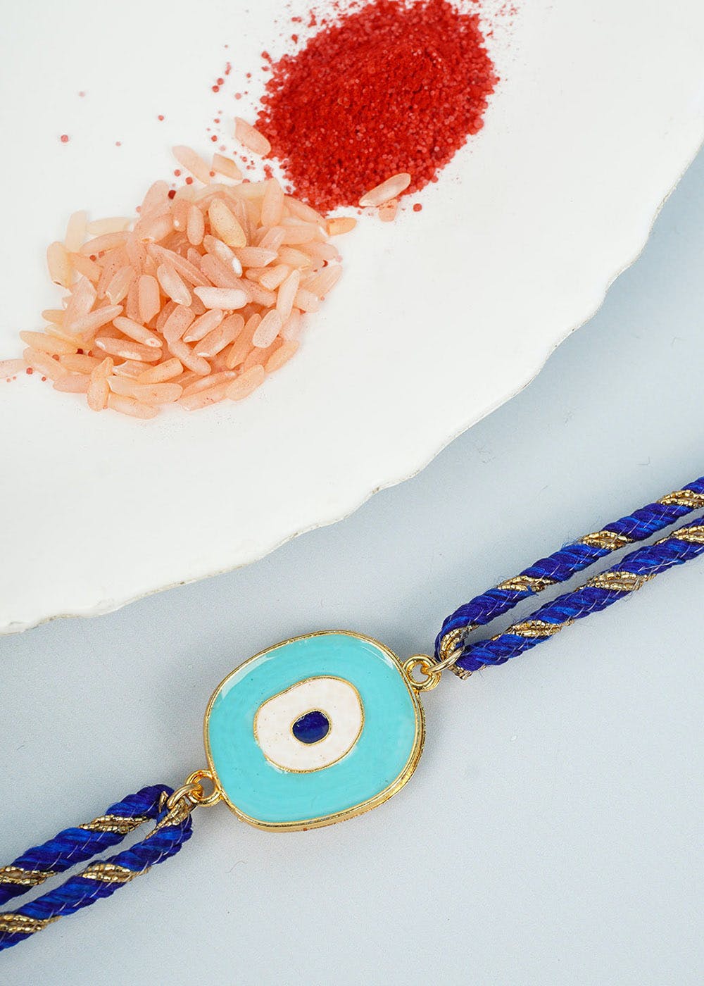 Get Sky Blue Evil Eye Rakhi at ₹ 275 | LBB Shop