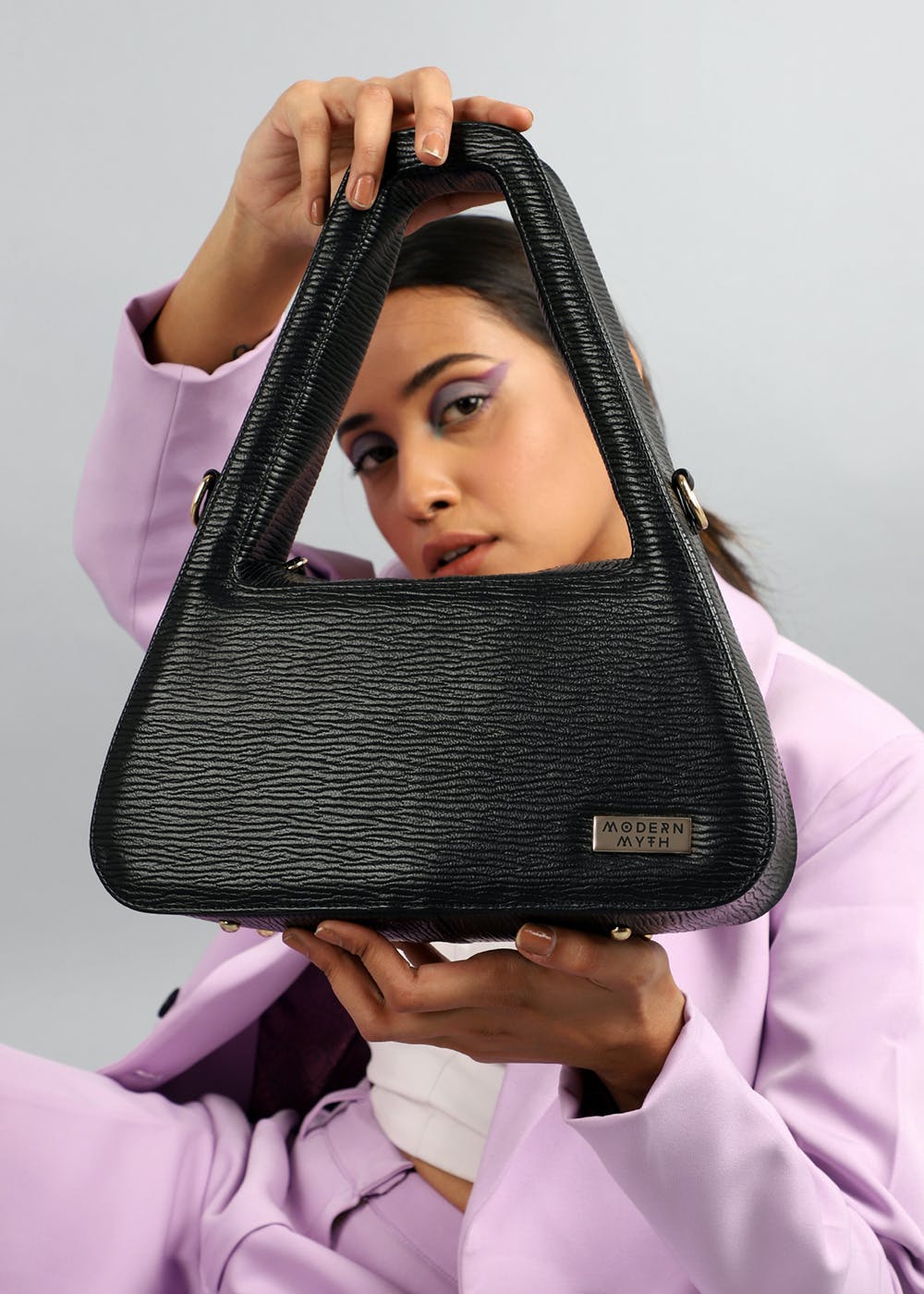 Get Black Ribbed Triangle Shaped Handbag at ₹ 2399 LBB Shop